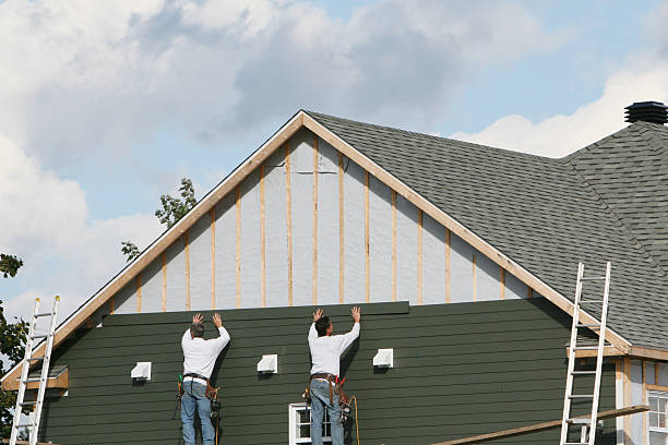 Professional Siding technician working in Riverside, IL